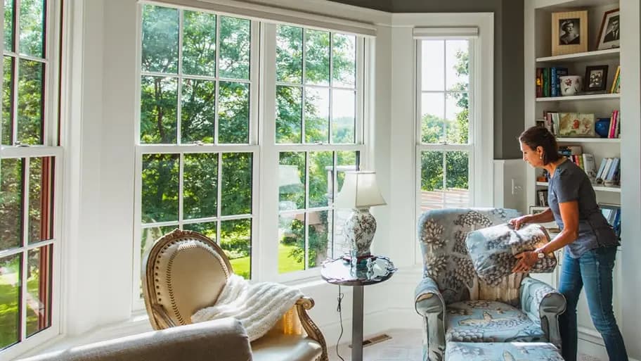 White-framed Andersen A-Series windows with divided lites