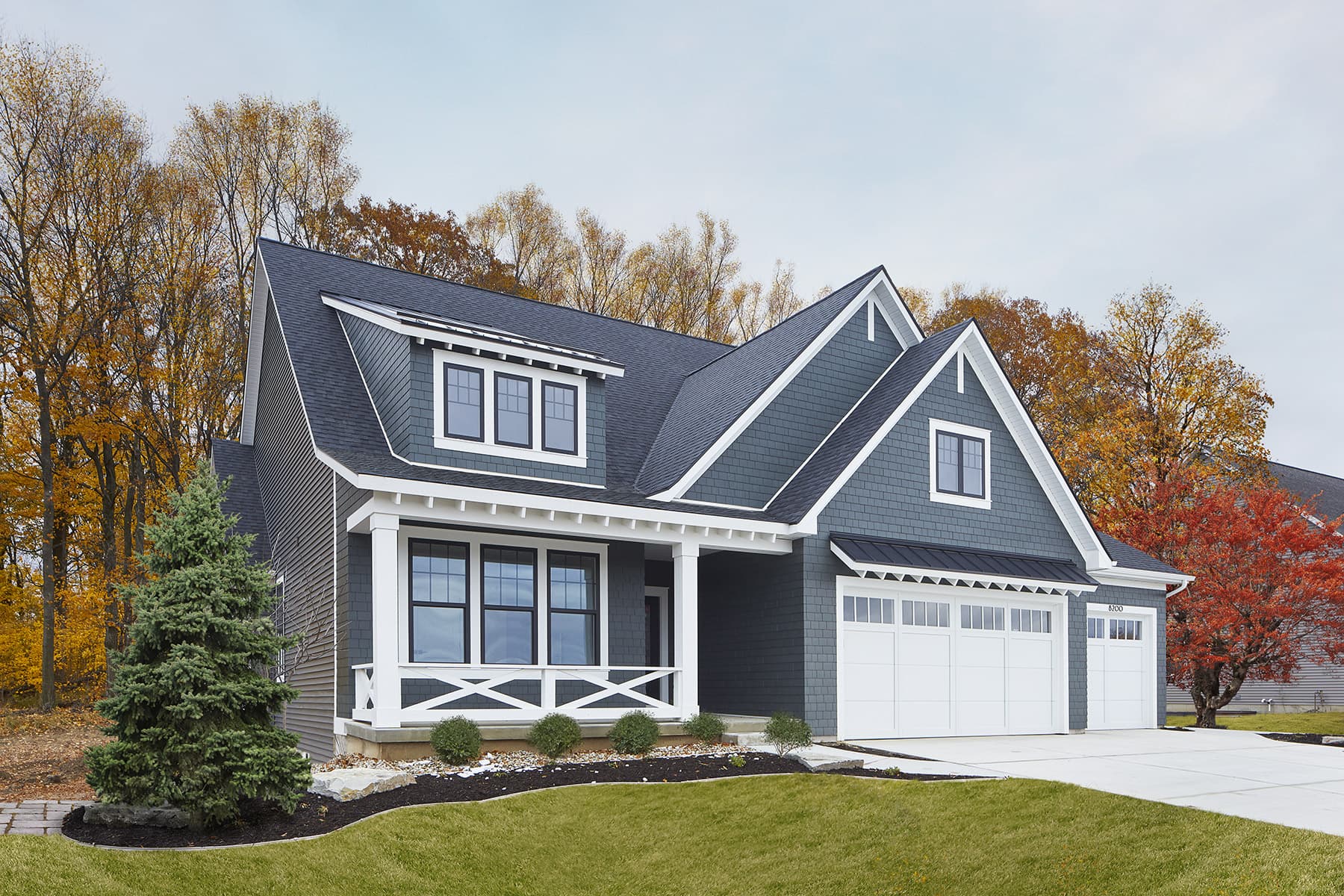 A coastal home clad in cellular-PVC shingle siding