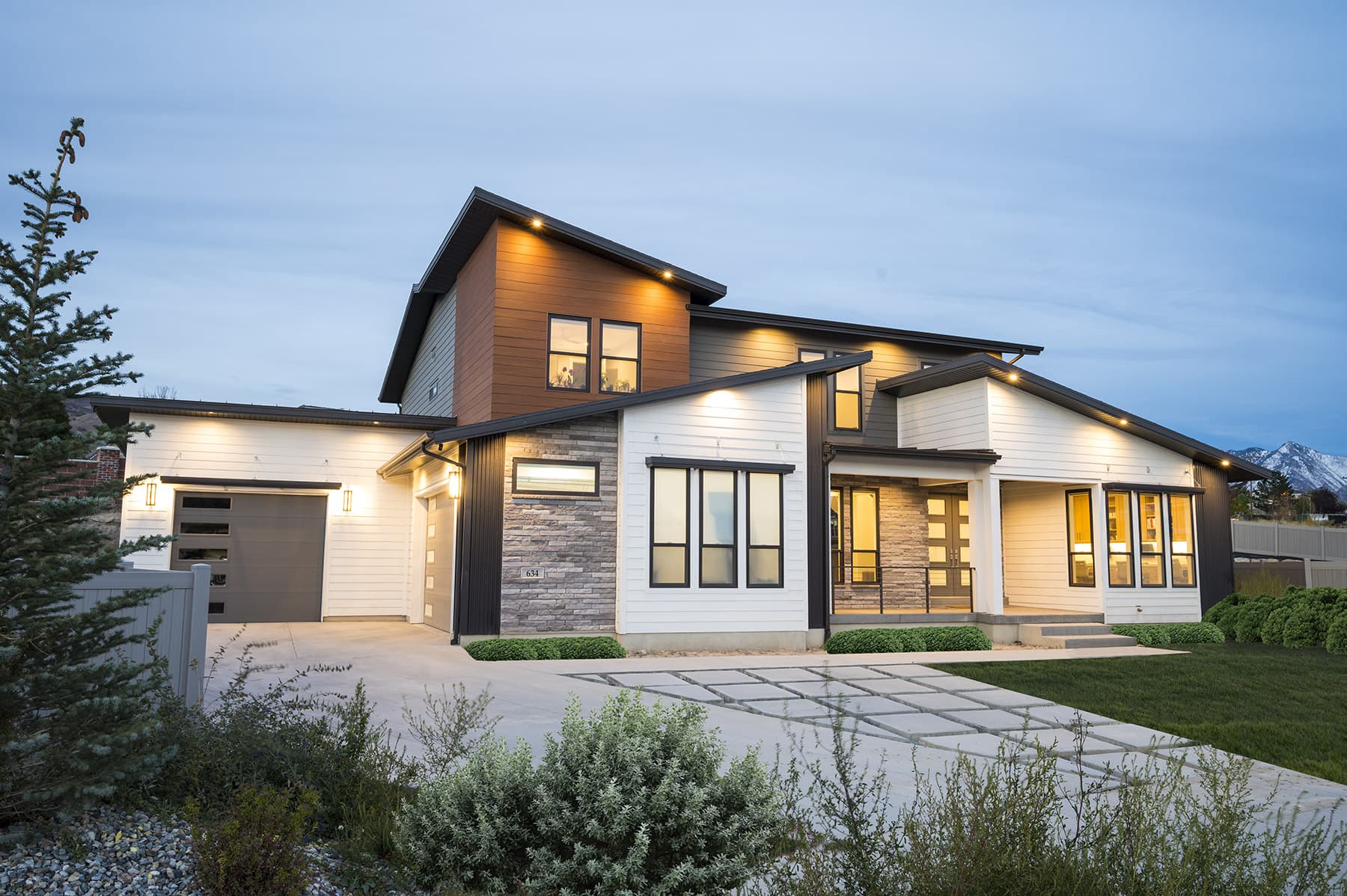 A coastal or modern-farmhouse home clad in AZEK cellular-PVC siding