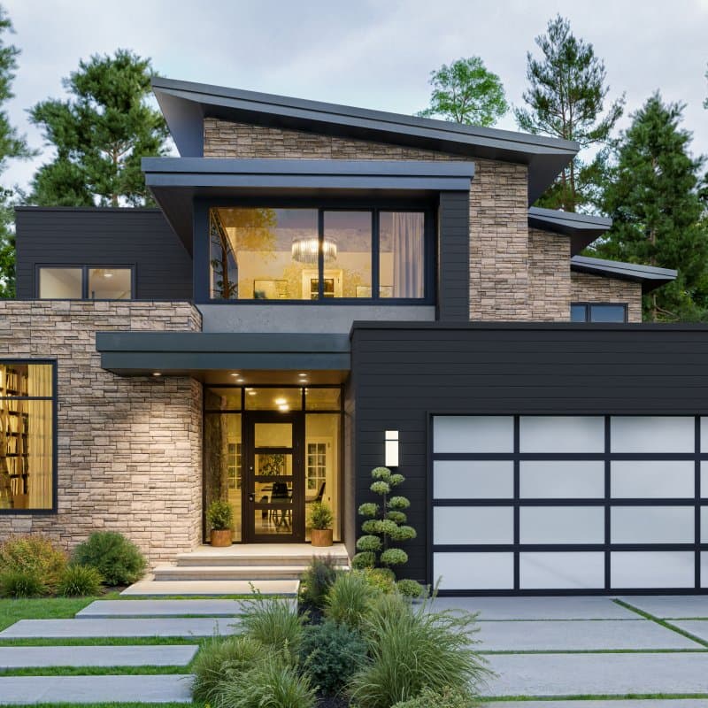 A modern house with black composite lap siding
