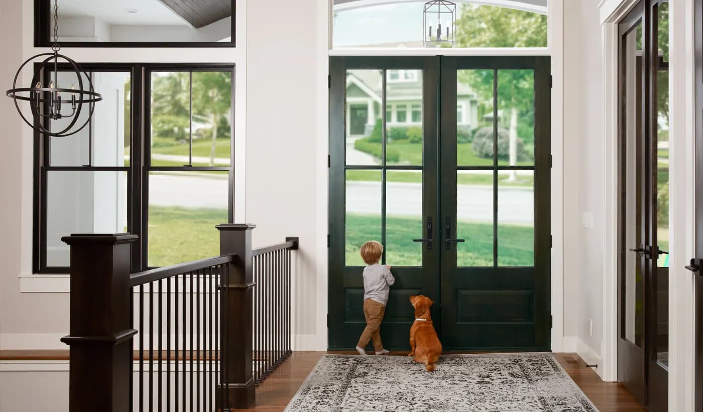 Andersen double entry doors anchoring a home's curb appeal