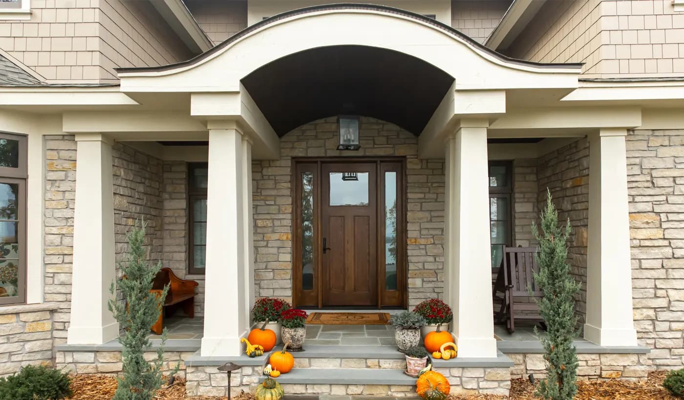 A traditional Andersen entry door on a residential front elevation