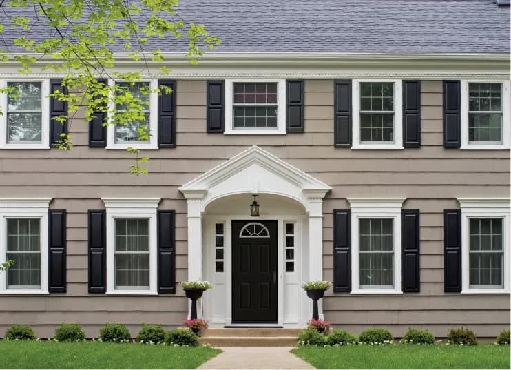 Therma-Tru manufacturer photo — a traditional entry door replacement, before