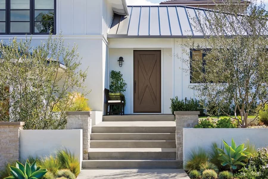A Therma-Tru entry door on a residential front elevation