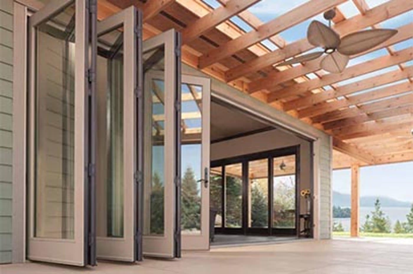 Andersen bi-fold (accordion) glass door a wide wall of glass opening to the outdoors