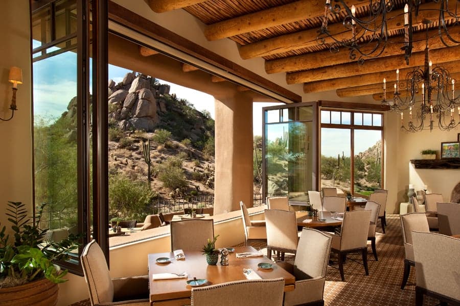 Andersen bi-fold (accordion) glass door blurring the line between inside and out