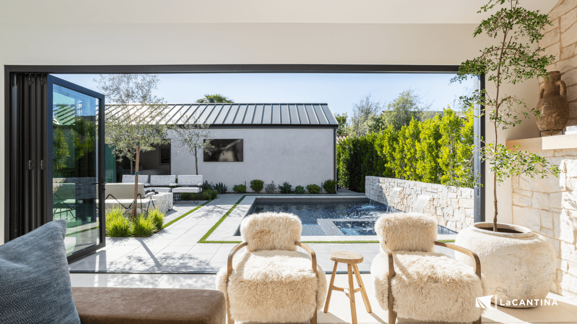 LaCantina opening glass wall framing an indoor-outdoor living space