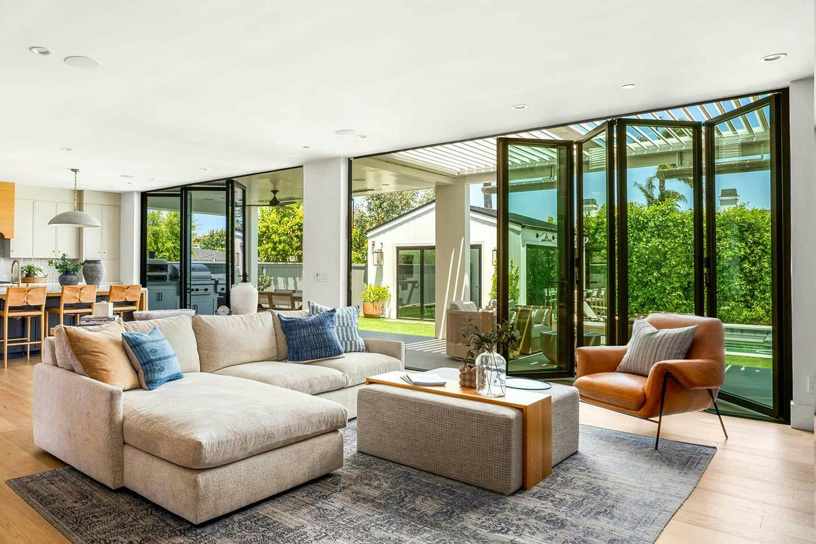 NanaWall multi-slide glass wall framing an indoor-outdoor living space
